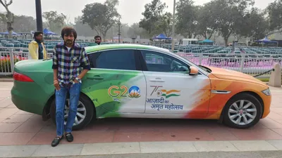 gujarat man facelifts his jaguar car in g20 colors  to raise awareness