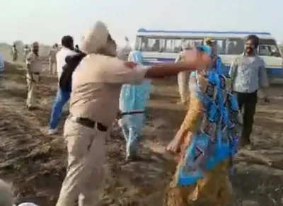 farmers block railway tracks in punjab after cop slaps woman protesting against land acquisition