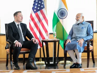 tesla s elon musk to visit india  likely to unveil investment plans in meeting with pm modi  says reuters report