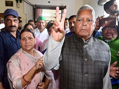  whoever will try to change the constitution  people will gouge out their eyes   lalu yadav attacks bjp