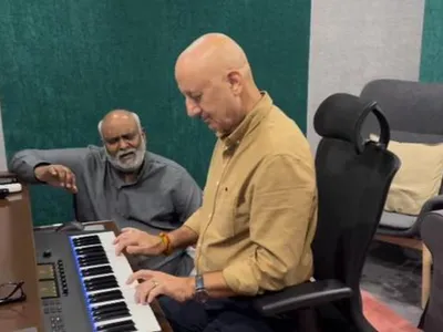 anupam kher learns how to play piano from mm keeravani