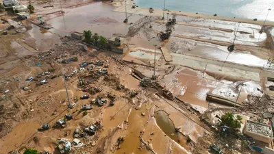 un revises toll from libya floods to 3958  over 9000 injured