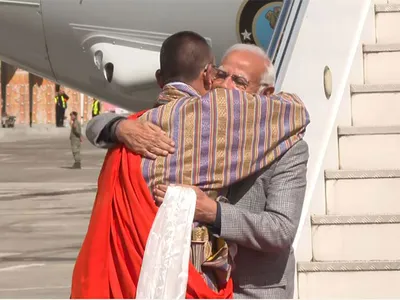  warm hug  guard of honour   pm modi receives grand reception as he arrives in bhutan for state visit