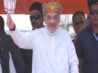 lok sabha elections  home minister amit shah holds mega road show in ahmedabad