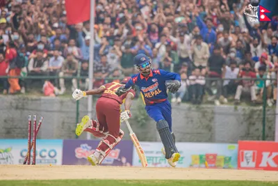 nepal wins first match of t20 series with west indies a  rohit paudel scores century