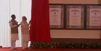 pm modi unveils plaque  dedicates new parliament building to nation