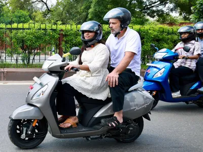 rahul gandhi rides pillion on girl student’s scooter in jaipur
