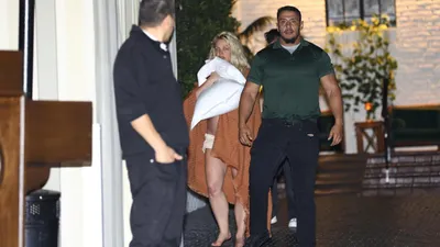 britney spears involved in heated fight with boyfriend  leaves hotel barefoot  wrapped in blanket  ambulance called