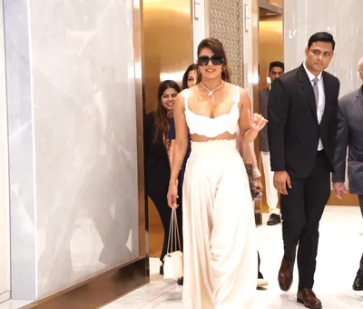 priyanka chopra raises glam quotient in white outfit at an event in mumbai