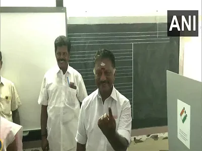 former tamil nadu chief minister o panneerselvam casts his vote in theni  says bjp alliance will win in tamil nadu
