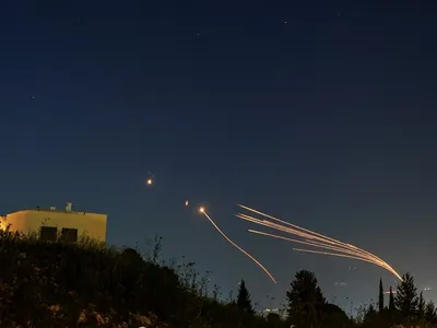 hezbollah fires dozens of missiles towards northern israel
