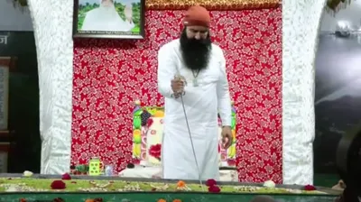 out on parole  dera chief cuts cake with sword  video goes viral