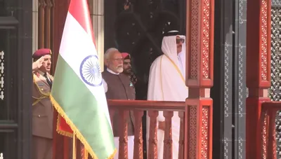 pm modi receives ceremonial welcome in doha  holds bilateral with amir of qatar