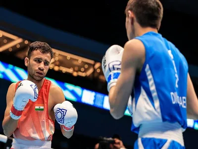 deepak goes down fighting on opening day of 1st world olympic boxing qualifier